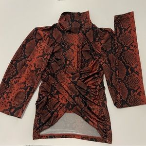 Red snakeskin turtle neck top
Topshop